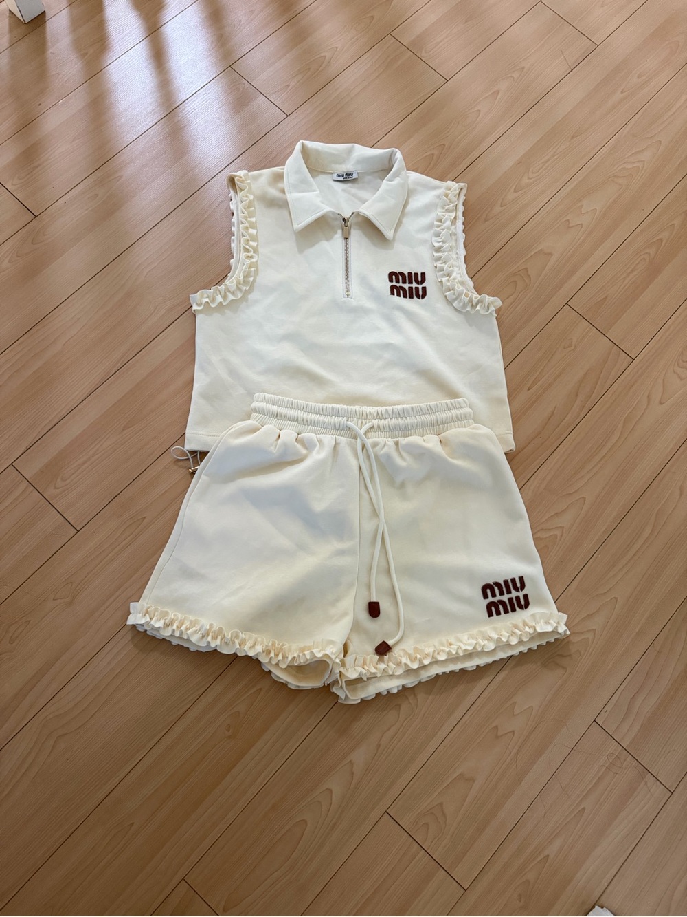 Miu Miu Cream Ruffle-Trim Sleeveless Zip Polo and Shorts Set